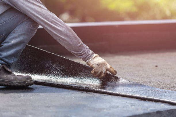 Professional Waterproofing technician working in Flanders, NY